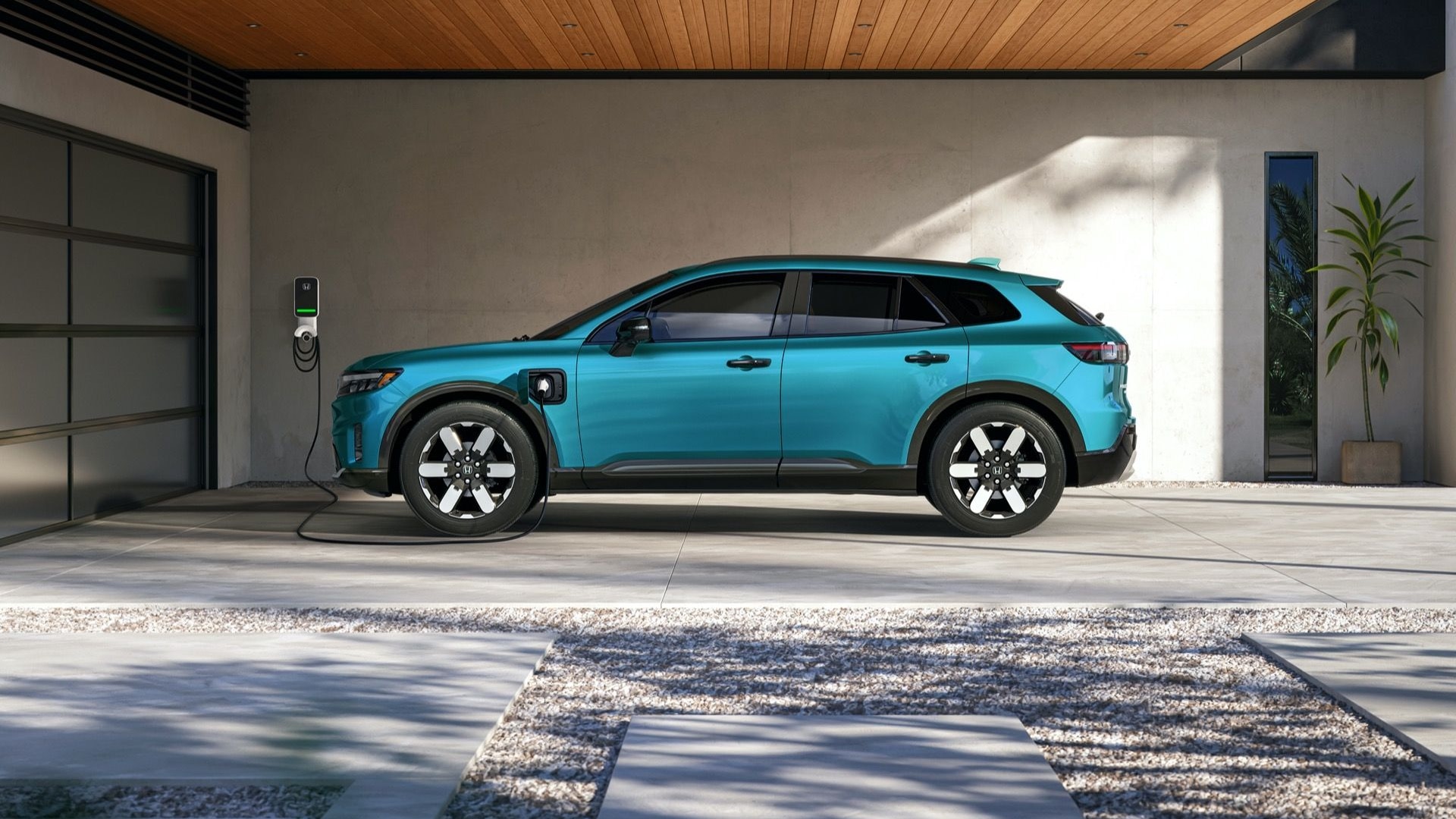 2024 Honda Prologue charging in a home driveway